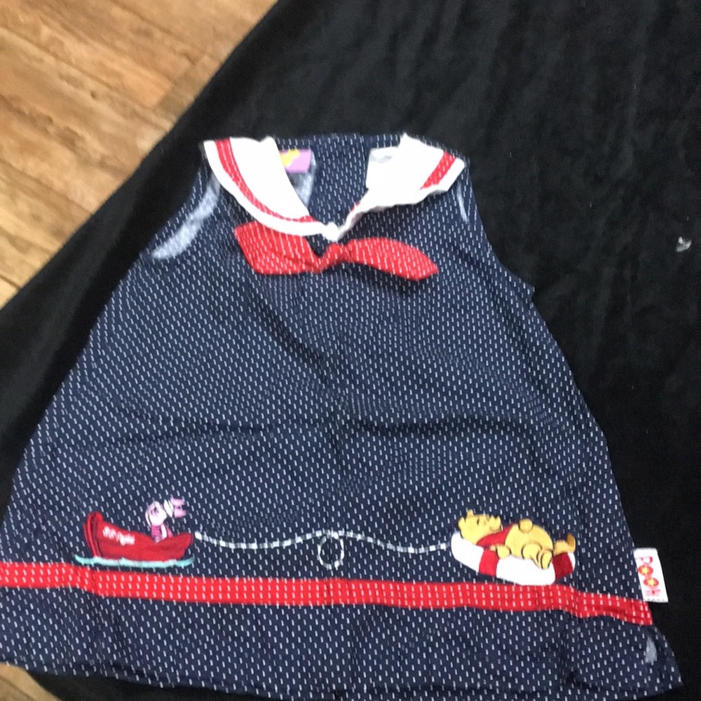 A Winnie the Pooh girls sailor dress 12 months
